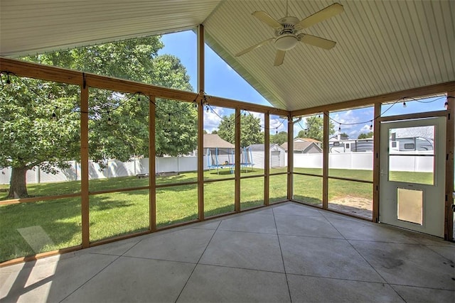 7950 Lehman Rd, Decatur, IL 62521 - unfurnished sunroom featuring a ceiling fan, lofted ceiling, and plenty of natural light