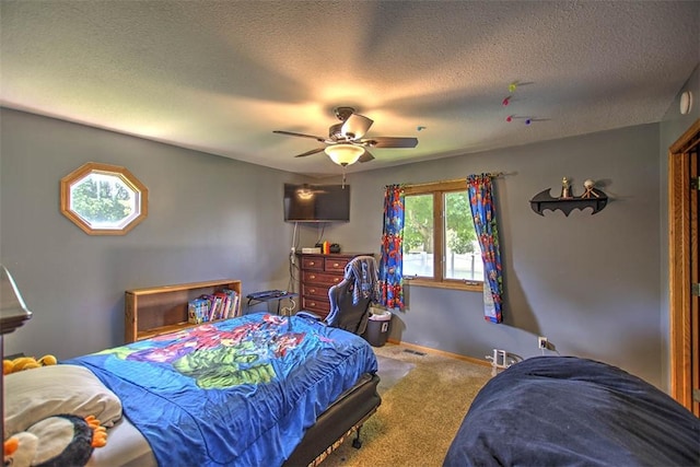 7950 Lehman Rd, Decatur, IL 62521 - carpeted bedroom featuring a textured ceiling and a ceiling fan