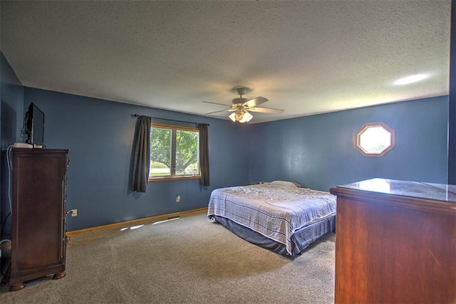 7950 Lehman Rd, Decatur, IL 62521 - carpeted bedroom featuring a textured ceiling and a ceiling fan