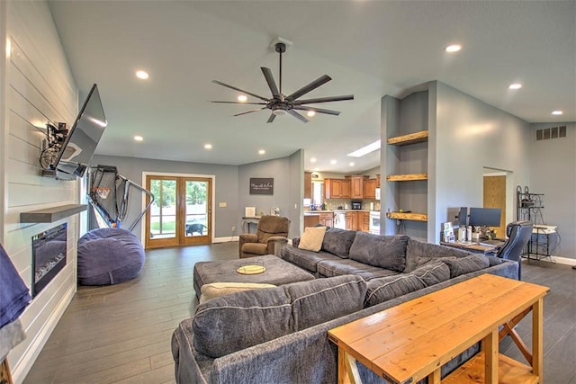 7950 Lehman Rd, Decatur, IL 62521 - living area featuring dark wood finished floors, a ceiling fan, recessed lighting, and french doors