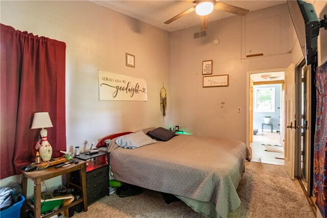 10622 N Rte 121, Latham, IL 62543 - bedroom with light colored carpet and ceiling fan