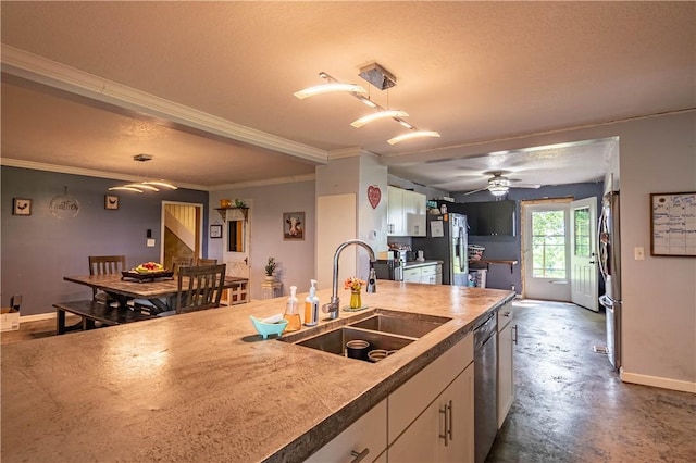10622 N Rte 121, Latham, IL 62543 - kitchen featuring a sink, appliances with stainless steel finishes, white cabinetry, ceiling fan, and decorative light fixtures