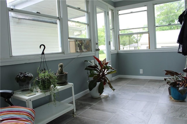 302 W N 3rd St, Shelbyville, IL 62565 - sunroom / solarium featuring baseboards and tile patterned flooring