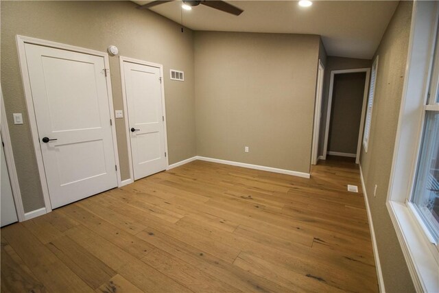 bedroom featuring hardwood / wood-style flooring and ceiling fan