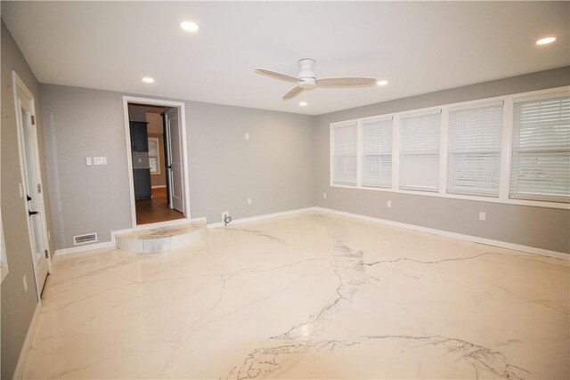 living room with ceiling fan