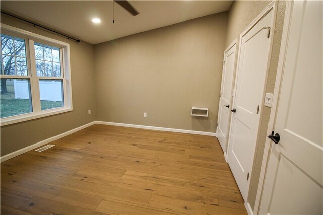 unfurnished bedroom featuring dark hardwood / wood-style floors