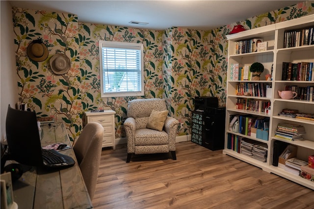 living area with wood-type flooring