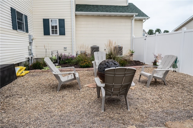 view of patio with an outdoor fire pit