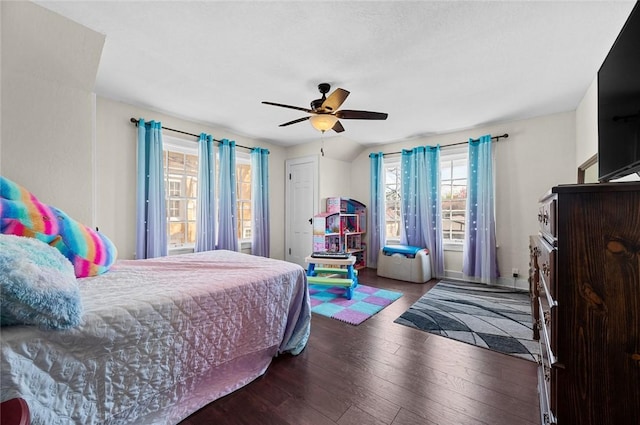 bedroom featuring hardwood / wood-style floors and ceiling fan