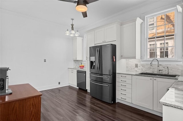 kitchen featuring a sink, stainless steel refrigerator with ice dispenser, backsplash, white cabinetry, and dishwasher