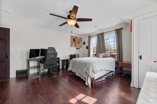 bedroom featuring wood finished floors and ceiling fan