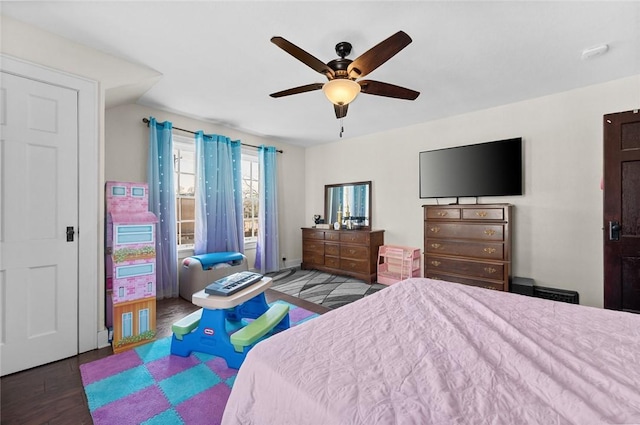 bedroom featuring a ceiling fan and wood finished floors