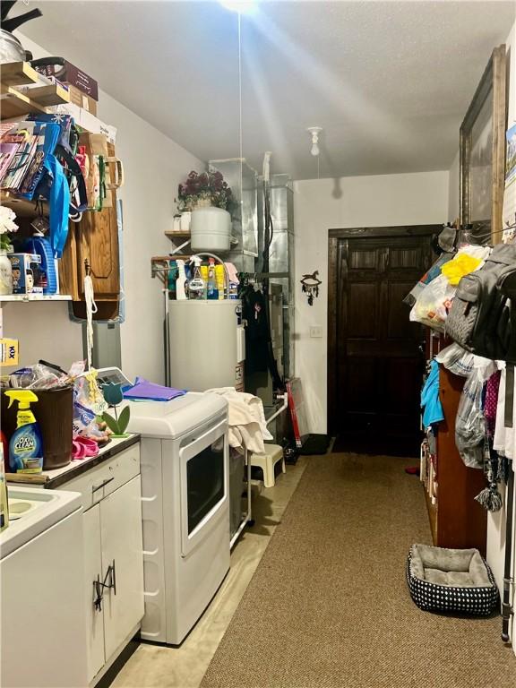 9275 N 890th St, Effingham, IL 62401 - laundry area featuring cabinet space and washing machine and dryer