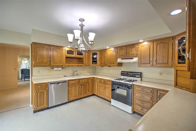 4324 Cleveland Ave, Decatur, IL 62521 - kitchen featuring dishwasher, gas range gas stove, under cabinet range hood, brown cabinetry, and recessed lighting