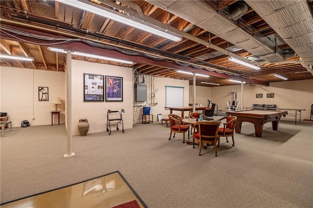 unfinished basement featuring pool table, carpet flooring, and electric panel