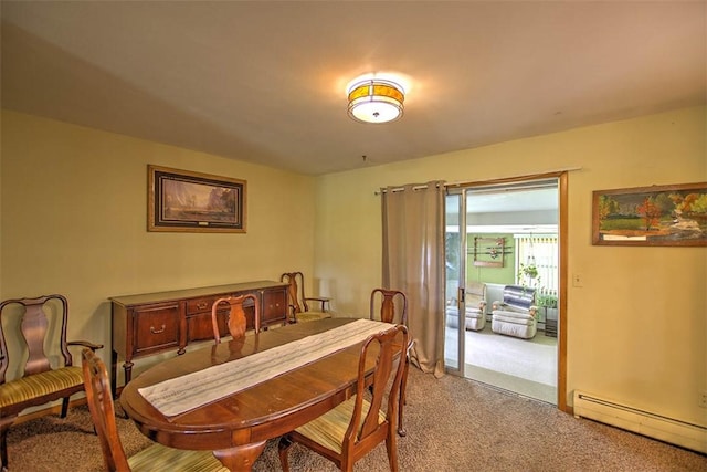 427 S Madison St, Cerro Gordo, IL 61818 - carpeted dining area with a baseboard heating unit