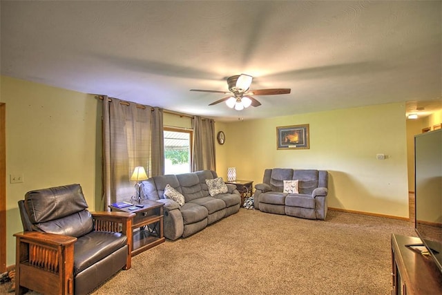 427 S Madison St, Cerro Gordo, IL 61818 - carpeted living area featuring ceiling fan and baseboards
