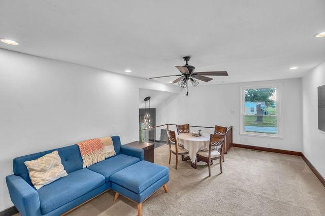 4170 N Taylor Ave, Decatur, IL 62526 - living area featuring carpet flooring, ceiling fan, and recessed lighting