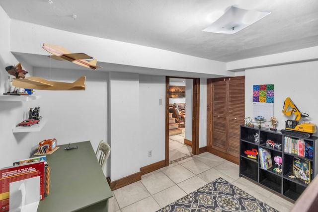4170 N Taylor Ave, Decatur, IL 62526 - office area with tile patterned floors and baseboards