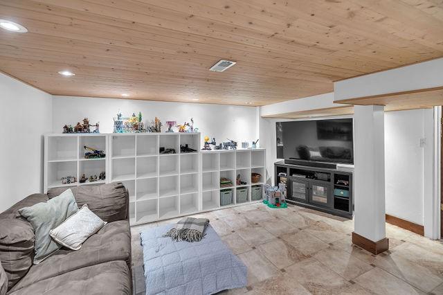 4170 N Taylor Ave, Decatur, IL 62526 - living area with wood ceiling and recessed lighting