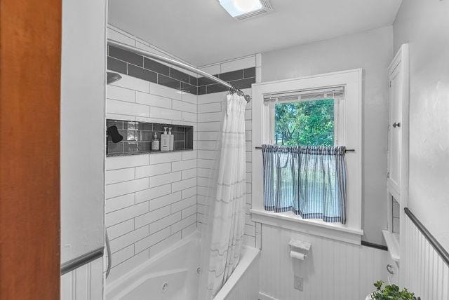 4170 N Taylor Ave, Decatur, IL 62526 - bathroom with a combined bath / shower with jetted tub and a wainscoted wall