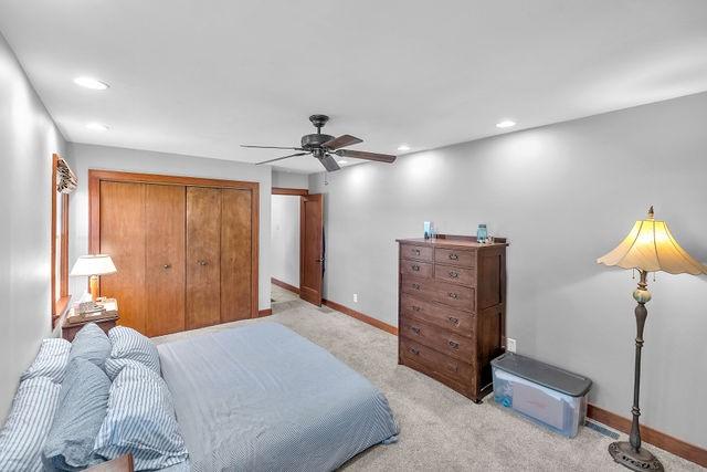 4170 N Taylor Ave, Decatur, IL 62526 - bedroom featuring light colored carpet, a closet, recessed lighting, and a ceiling fan