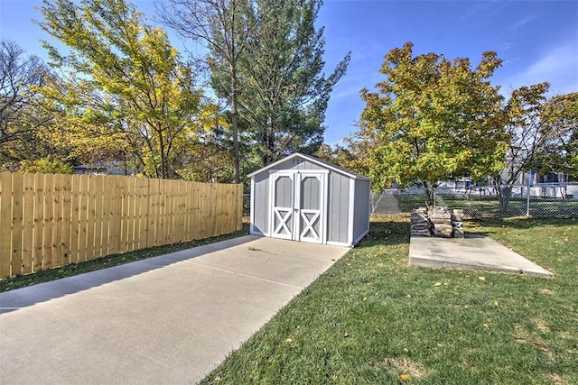 view of outbuilding featuring a yard