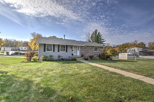 ranch-style home with a front yard