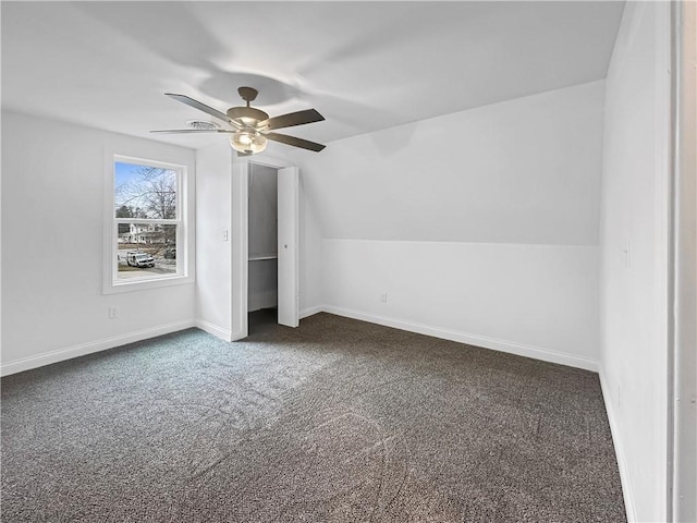 additional living space featuring vaulted ceiling, baseboards, ceiling fan, and carpet floors