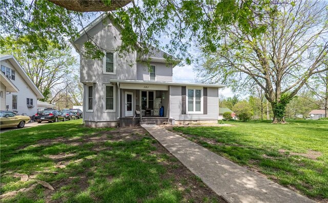 101 W N Water St, Bethany, IL 61914 - traditional-style house with a front lawn