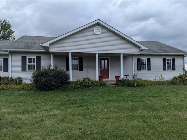 ranch-style house with a front lawn