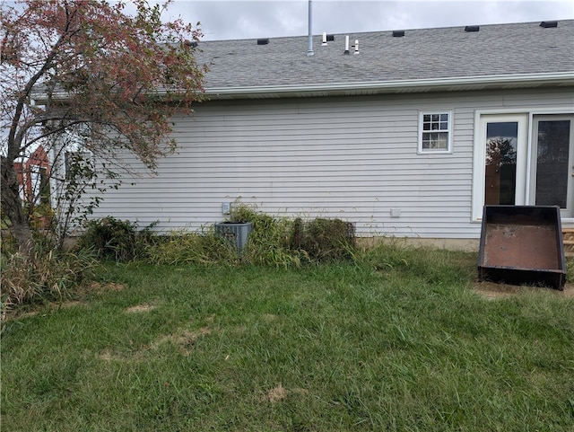 view of property exterior featuring a yard