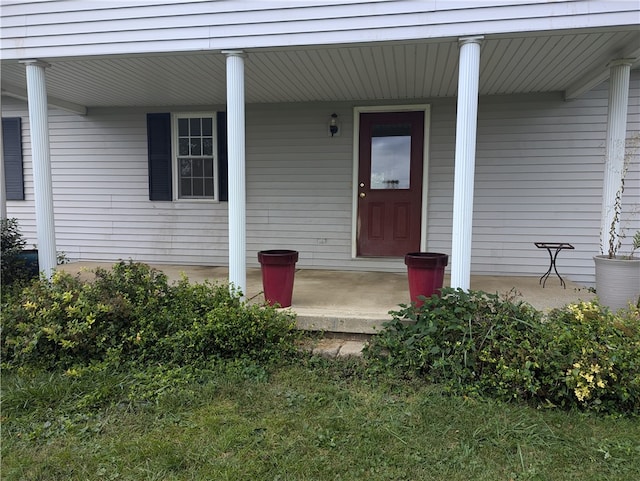 entrance to property with covered porch