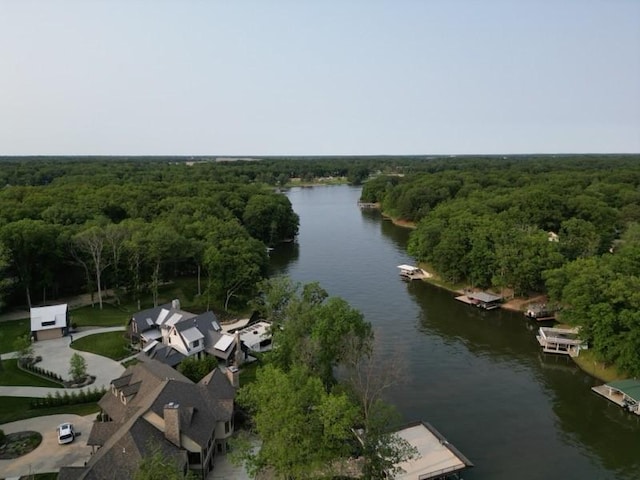 8404 E Twin Oaks Dr, Effingham, IL 62401 - aerial view of property and surrounding area featuring a large body of water and a forest