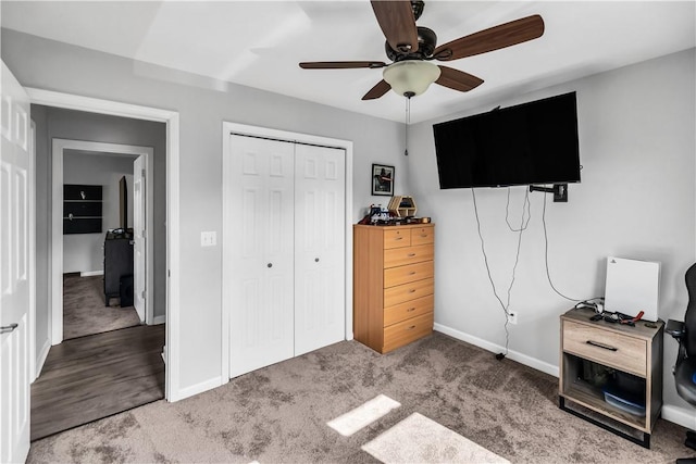 1450 W Westside Dr, Mt Zion, IL 62549 - carpeted bedroom featuring baseboards, a closet, and ceiling fan
