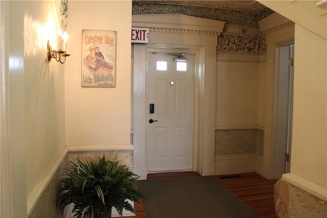 foyer with wood-type flooring