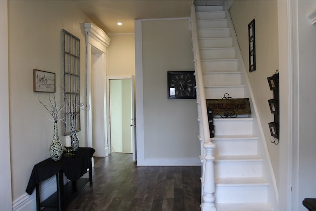 hallway with dark hardwood / wood-style floors