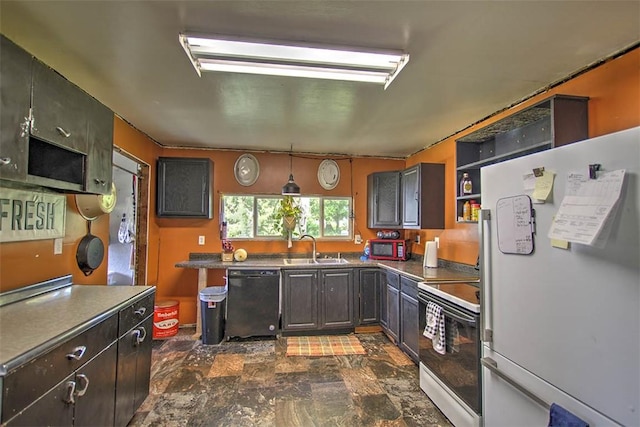 59 Lynn St, Weldon, IL 61882 - kitchen featuring white appliances, dark stone finish floors, dark countertops, and open shelves