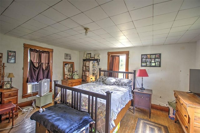 59 Lynn St, Weldon, IL 61882 - bedroom featuring hardwood / wood-style floors and cooling unit