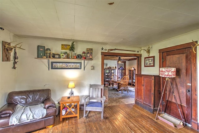 59 Lynn St, Weldon, IL 61882 - living area featuring dark wood finished floors