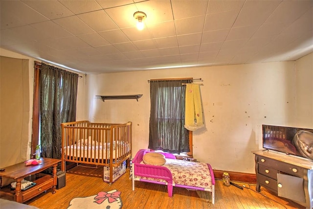59 Lynn St, Weldon, IL 61882 - bedroom with hardwood / wood-style flooring