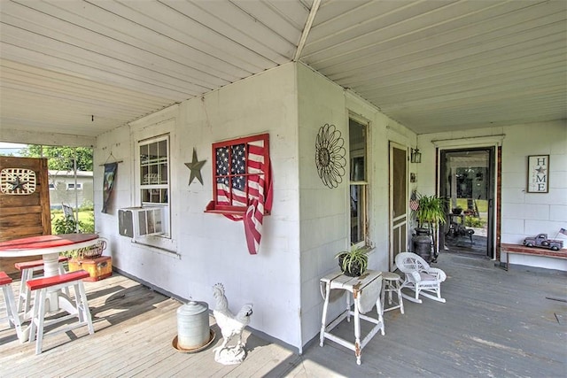59 Lynn St, Weldon, IL 61882 - wooden porch with cooling unit