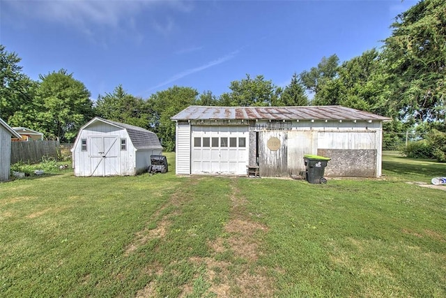 59 Lynn St, Weldon, IL 61882 - detached garage with a storage shed