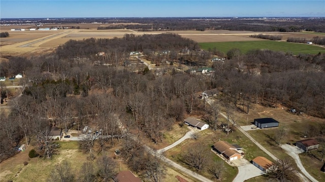 birds eye view of property featuring a rural view