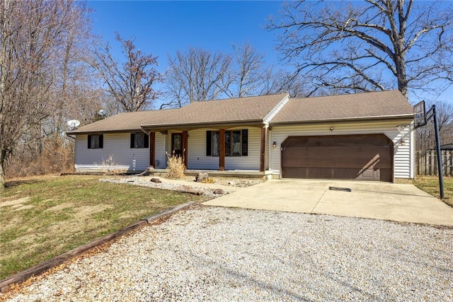 ranch-style home featuring a porch, a shingled roof, driveway, a front yard, and an attached garage