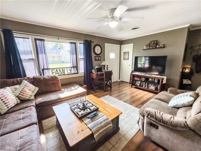421 S 8th St, Marshall, IL 62441 - living room featuring a ceiling fan, ornamental molding, and wood finished floors