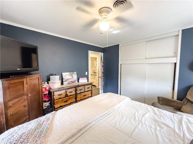 421 S 8th St, Marshall, IL 62441 - bedroom with a closet, crown molding, and a ceiling fan
