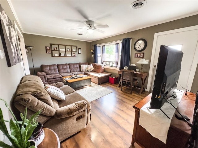 421 S 8th St, Marshall, IL 62441 - living room with ceiling fan, wood finished floors, and crown molding