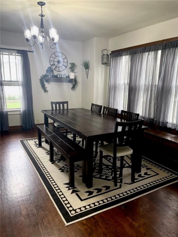 1705 Dewitt Ave, Mattoon, IL 61938 - dining area with a chandelier and wood finished floors