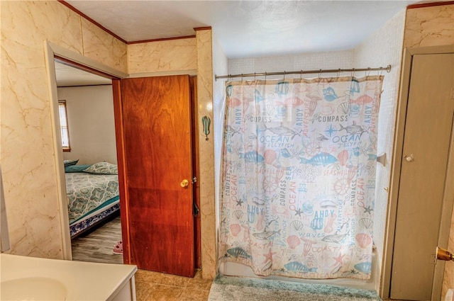 109 S Saint John St, Assumption, IL 62510 - ensuite bathroom with vanity, a shower with shower curtain, and ensuite bath